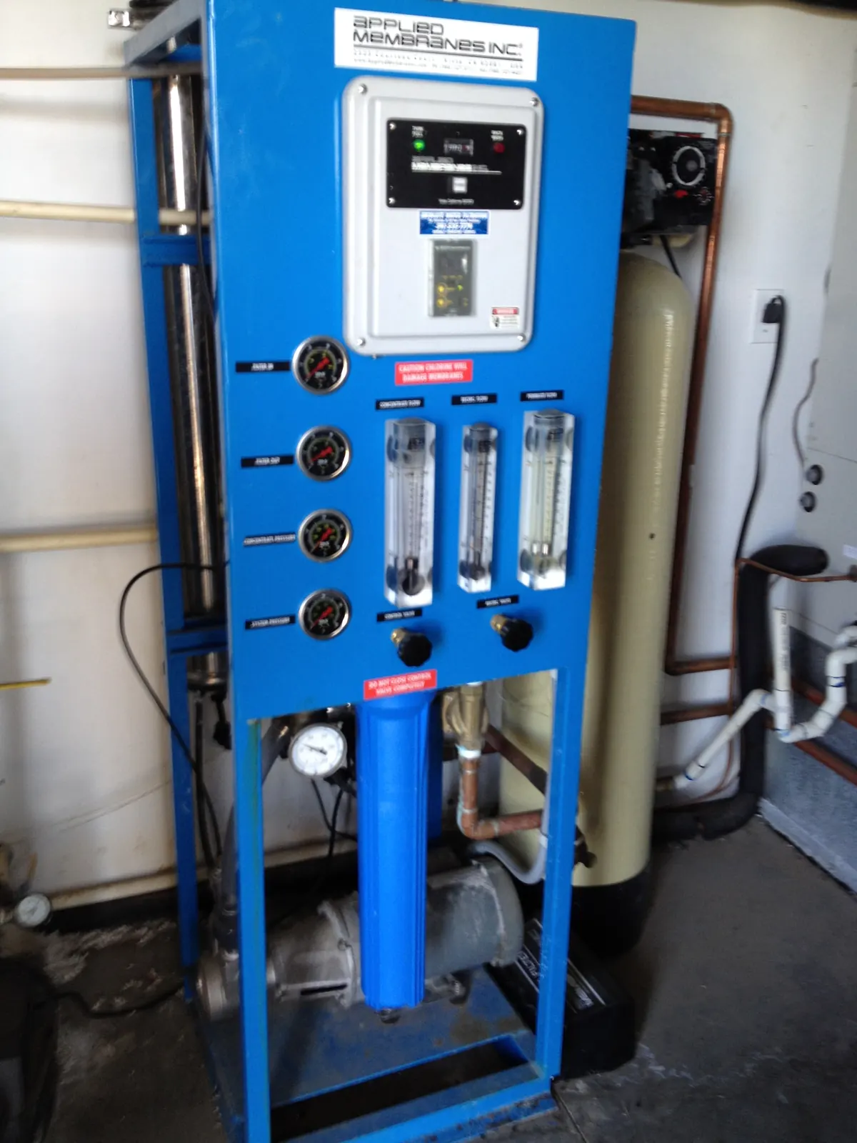 Applied Membranes RO controls, flow meters, and pressure indicators.