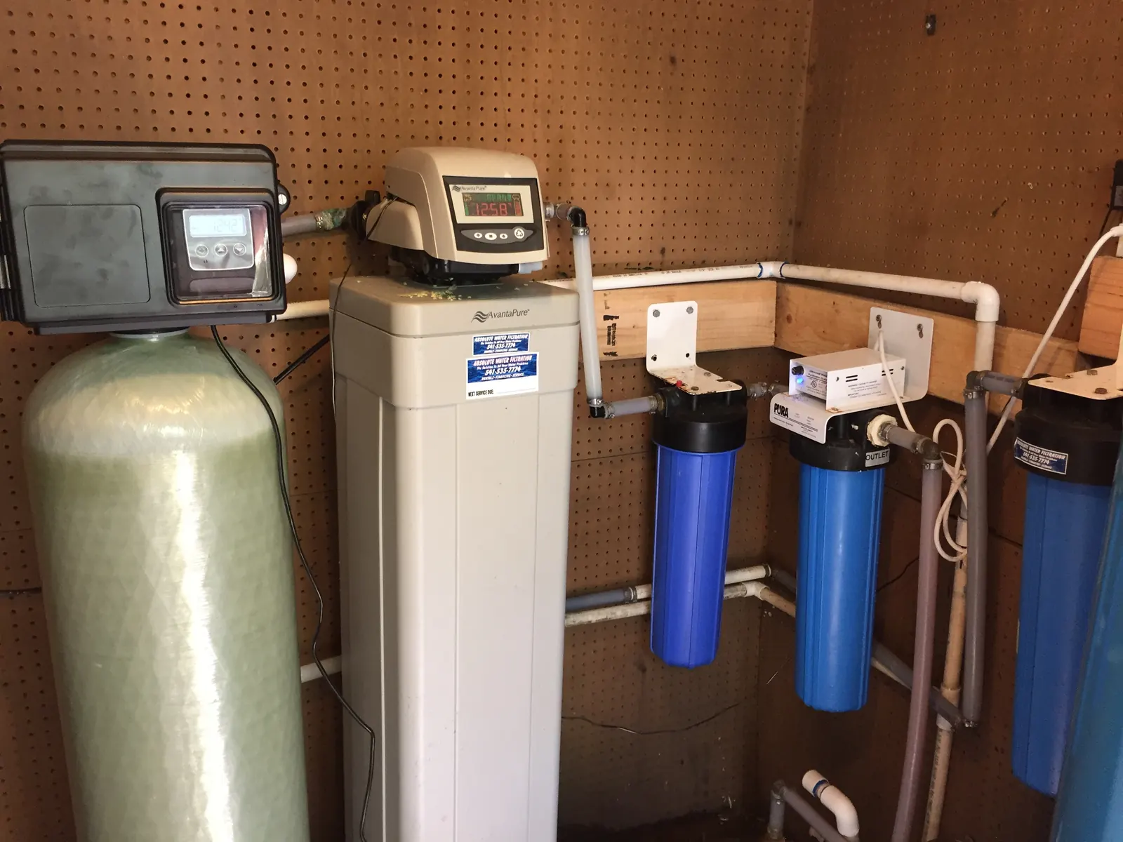 AvantaPure metered softener alongside whole-house prefilters.
