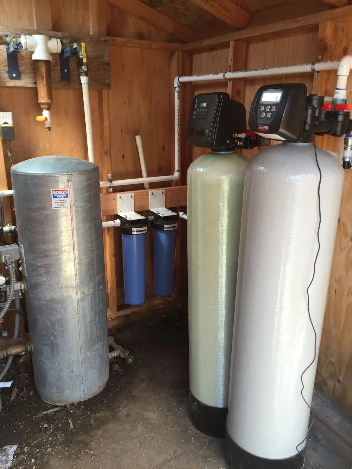 Well-water stack with dual media, bladder tank, prefilters.